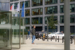 Man in front of a building